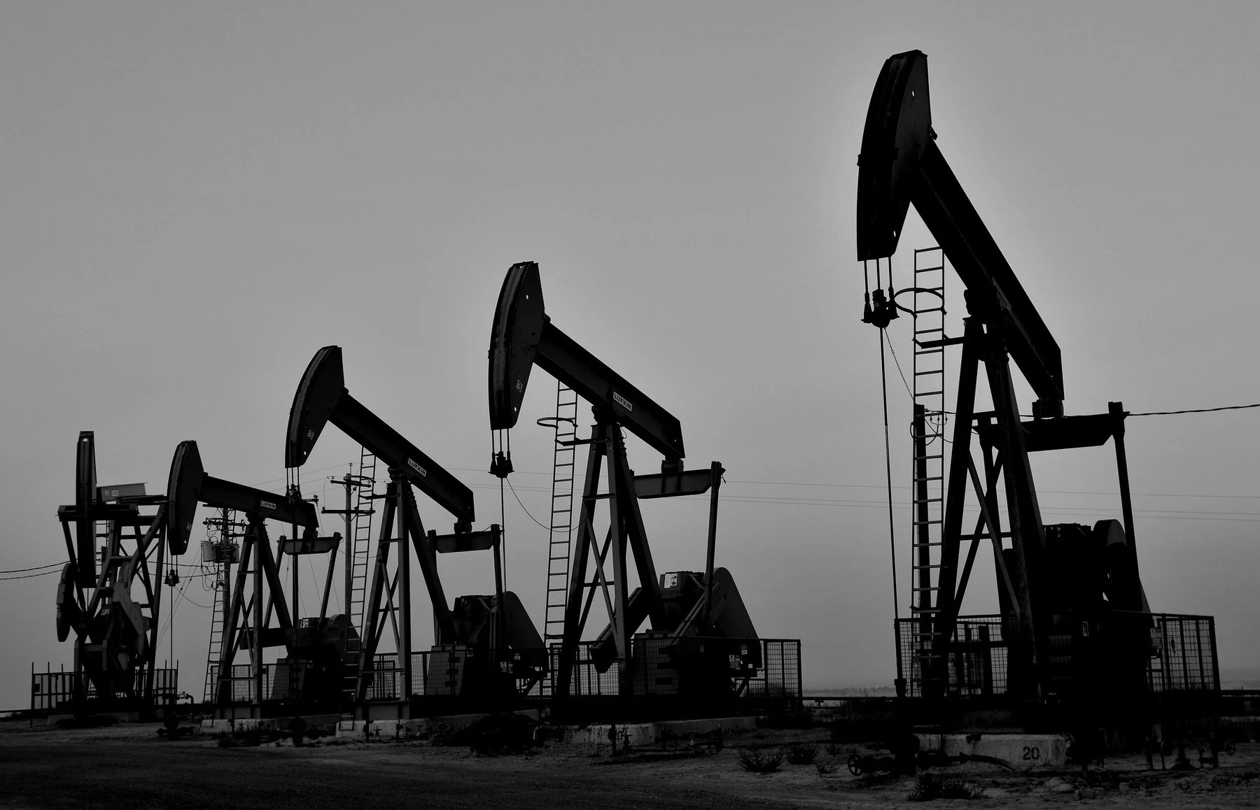 Pumpjacks silhouetted at dusk